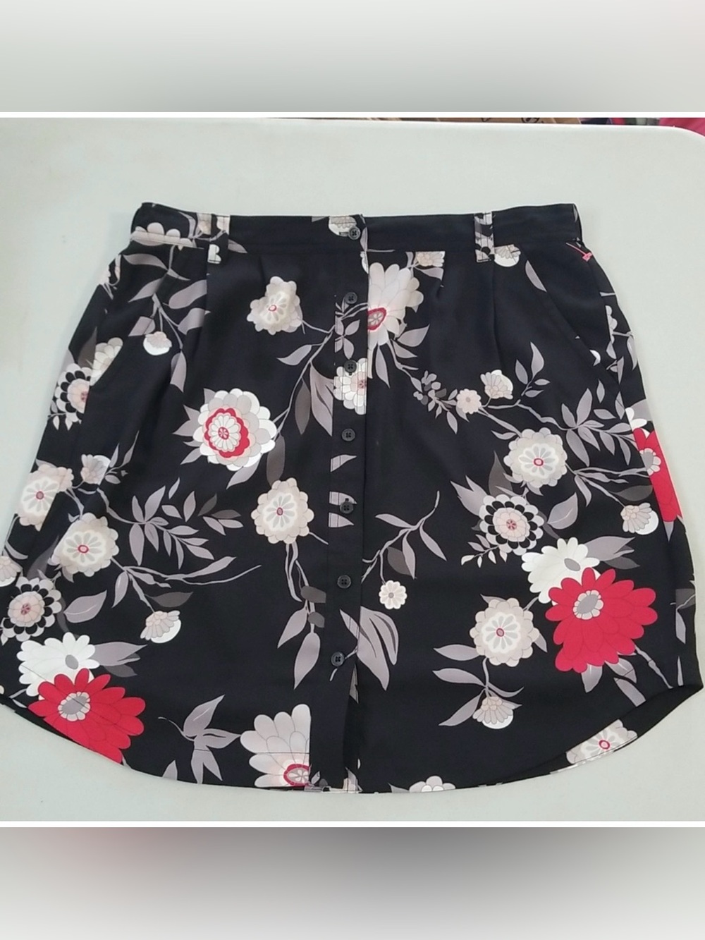 Loft Skirt Size Medium with Floral Pattern lined with Button up Front